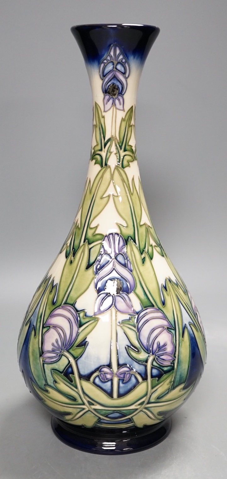 A Moorcroft 'wolfsbane' vase by Anji Davenport, 8.11.01, 99/350, 30 cms high.